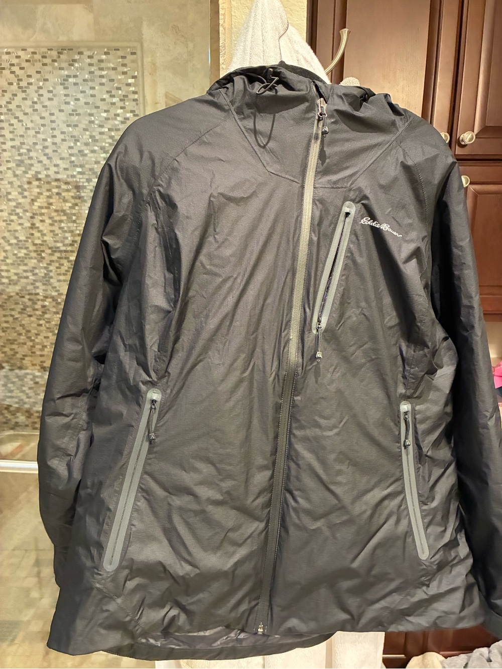 Eddie Bauer first ascent  Black Hooded ski jacket  down filler